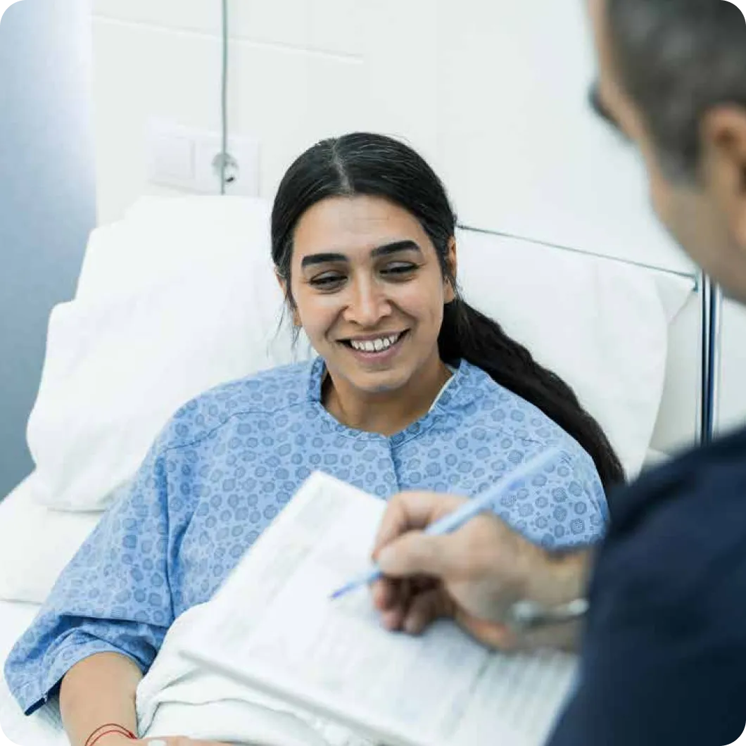 Patient speaking with a healthcare professional in hospital